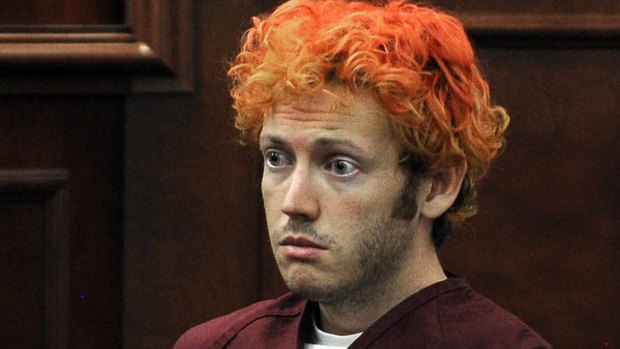 Shooting suspect James Holmes, who appeared in a Colorado court yesterday,  is in solitary confinement.