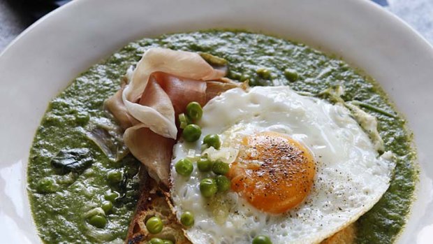 Leek, pea and spinach soup with fried egg and ham.