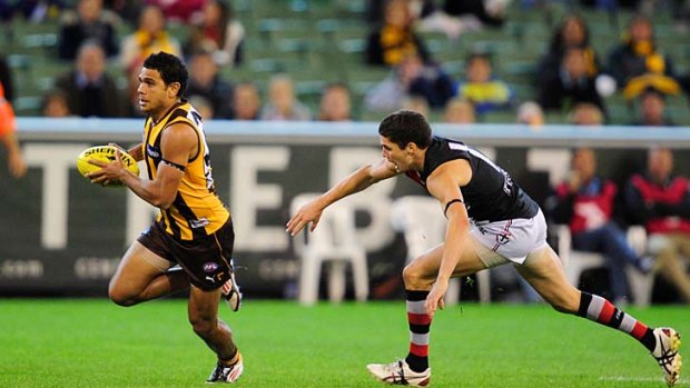 Off to the races: Cyril Rioli on his way to another goal at the MCG.