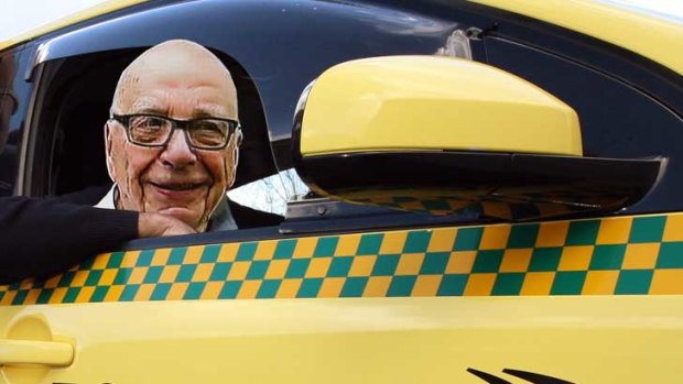 Would you listen to Rupert Murdoch if he was driving your taxi?  <i>Digitally altered image</i>