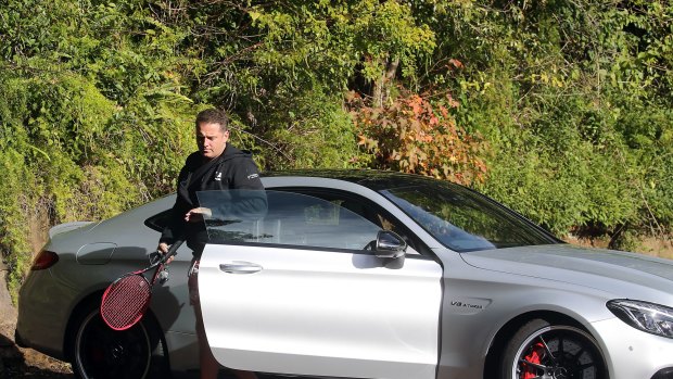 Karl Stefanovic driving a $177,000 Mercedes Benz coupe.