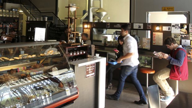 Bean encounter &#8230; customers can view the coffee-roasting room through a large internal window.
