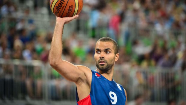 Talisman: Tony Parker of France holds up the ball during a friendly basketball match Slovenia vs. France in Ljubljana.