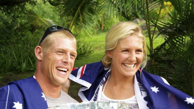 Champions . . . Mick Fanning and Stephanie Gilmore.