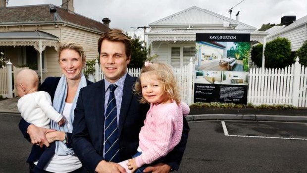 Alicia and Tom Staughton with their children Will and Claudia outside their home in Hawthorn.