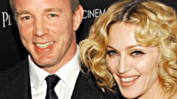Kids spur reunion ... Madonna and Guy Ritchie make amends for the sake of their children.