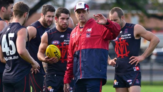 Undecided: Paul Roos with his players.