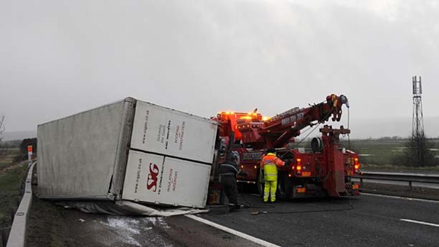 Blown over ... a lorry was turned on its side on the  southbound M9 motorway near Stirling, Scotland.