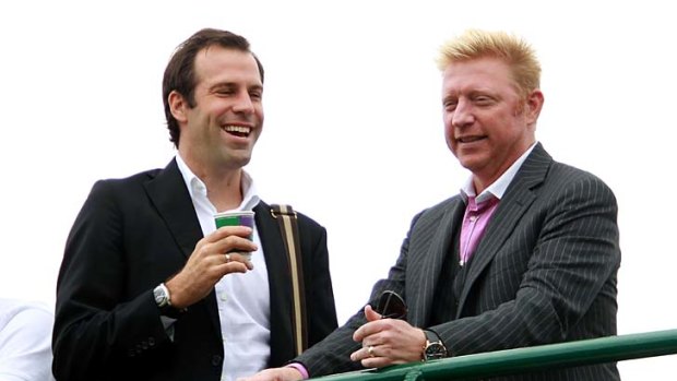 Former pros Greg Rusedski and Boris Becker at the Wimbledon championships on Saturday.