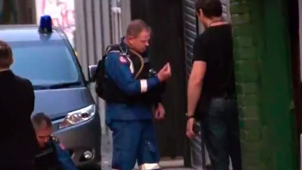 Police conduct a search in Surry Hills.