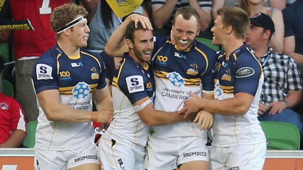 The Brumbies celebrate their sixth-straight win on the road.