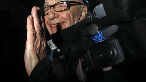On the case: Rupert Murdoch arriving in London yesterday to hold meetings with staff who are threatening legal action at his British mastheads.