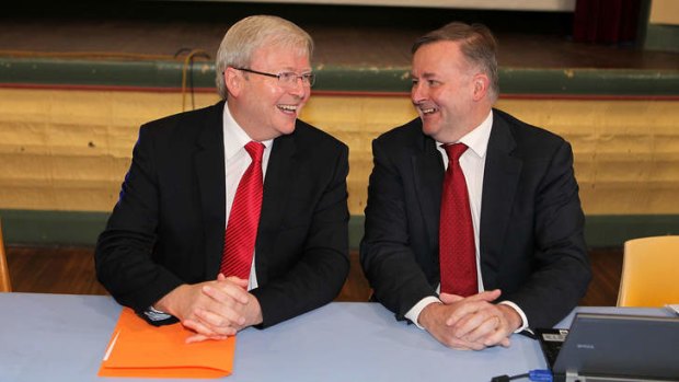 Prime Minister Kevin Rudd jokes with Deputy Prime Minister Anothony Albanese at the meeting of caucus at Balmain Town Hall.
