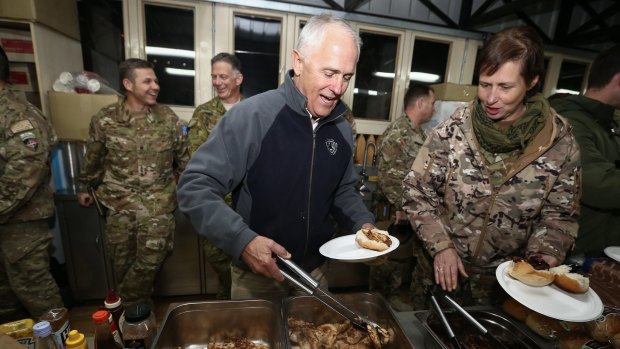 Prime Minister Malcolm Turnbull joins troops for dinner at the ADF recreation area in Kabul, during a visit to Afghanistan.