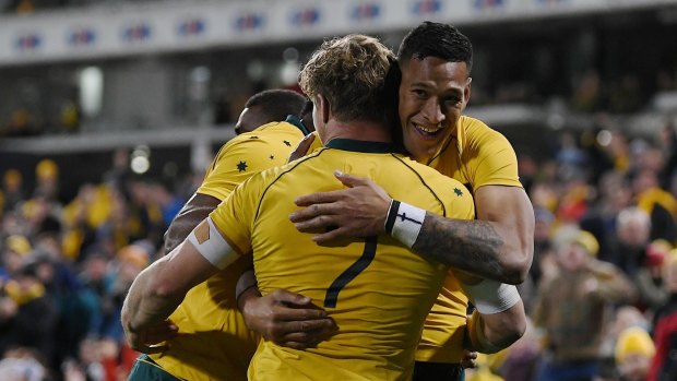 Israel Folau of the Wallabies celebrates after scoring a try against Argentina. 