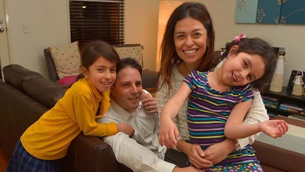 Helena and Mauricio Barriga at home with their daughters Violeta, 5, and Sofia, 8.