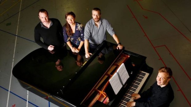 Principal singers Hayden Tee, Patrice Tipoki and Simon Gleeson with music supervisor James Dodgson during rehearsals for the new Melbourne production of <i>Les Miserables</i>.
