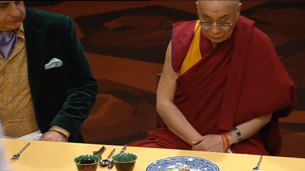 Reflective ... The Dalai Lama is served.