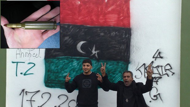 Libyans photographed by Terry Hinz, and a bullet he found in Benghazi, inset.