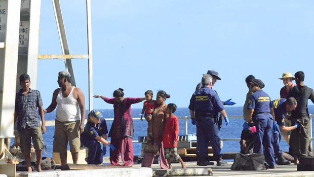 Refugees from Sri Lanka arrive for processing at Christmas island last week.