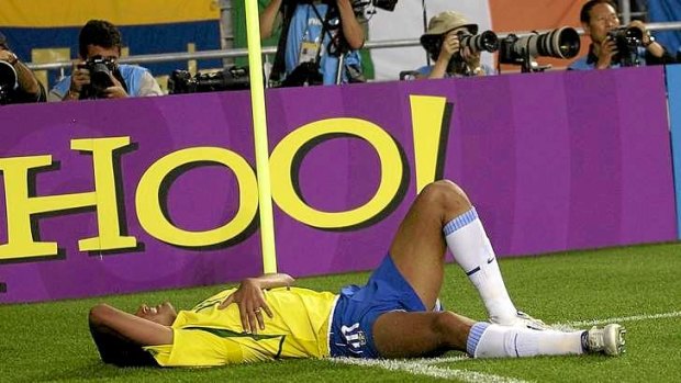 Stamp it out: Rivaldo of Brazil infamously feigns injury at the 2002 World Cup.