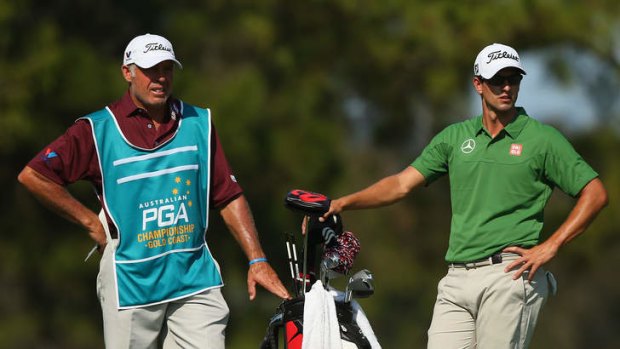 Formidable partnership: Adam Scott and his caddy Steve Williams at Royal Pines on Friday.