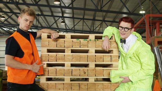 Comedians Joel Creasey (left) and Rhys Nicholson show they know how to do some manual work in a timber yard in the documentary The Gaycrashers.