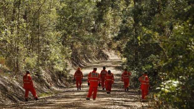 SES volunteers and NSW police search the Middle Brother Forest approximately 12km from Kendall.