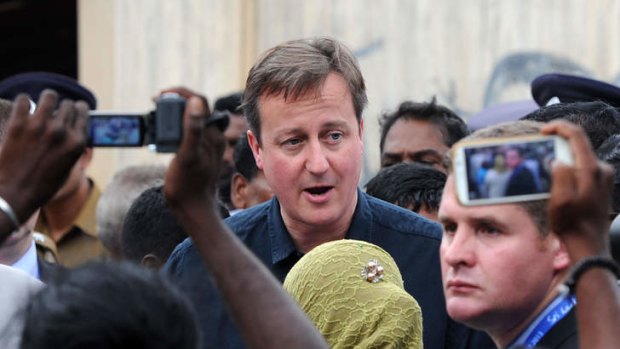 Mobbed by Tamil protesters: British Prime Minister David Cameron visits the former war-torn city of Jaffna, some 400 kilometres north of Colombo.