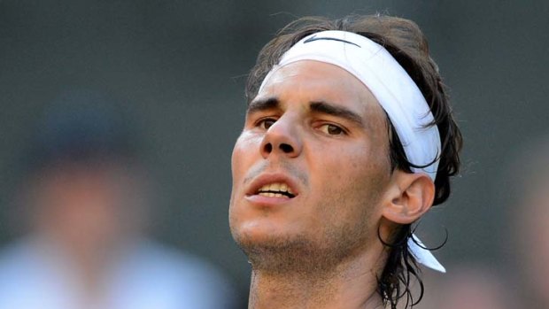 Down and out &#8230; Rafael Nadal suffered a rare early defeat.