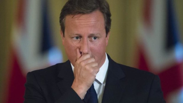 British PM David Cameron says the UK will take passports of those planning to travel to Syria and Iraq to fight.