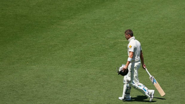 Defeated: Michael Clarke walks off the field after being dismissed by Stuart Broad.