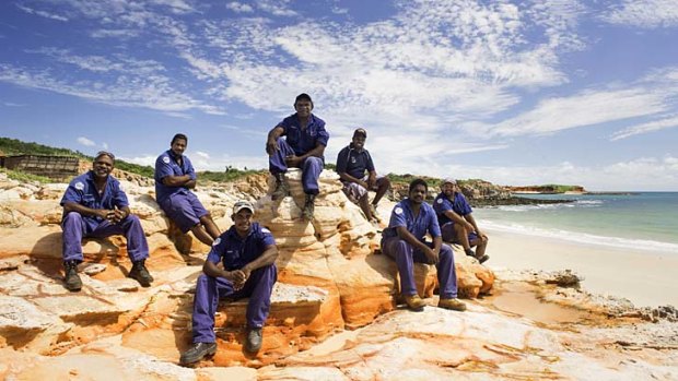 Looking after the land: A group of indigenous rangers take a break. About 680 rangers are employed on more than 50 indigenous protected areas.
