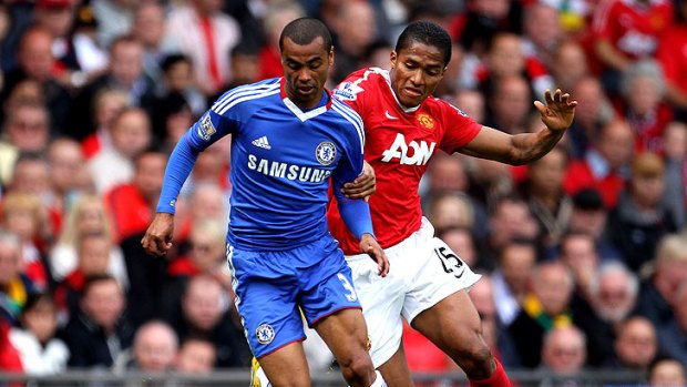 Manchester United's Antonio Valencia battles with Chelsea's Ashley Cole.
