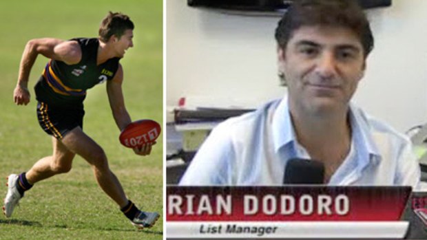 Whoops ....Young footballer Shaun Atley and Essendon recruiting manager Adrian Dodoro.