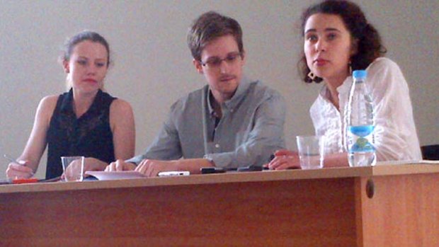 US National Security Agency leaker Edward Snowden, centre, during a meeting with rights activists at Moscow's Sheremetyevo airport. Snowden continues to remain in the transit zone of the Moscow airport while Russian authorities process his asylum request.