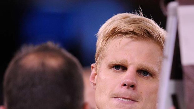 Things are looking grim: Nick Riewoldt ponders Ross Lyon's message.
