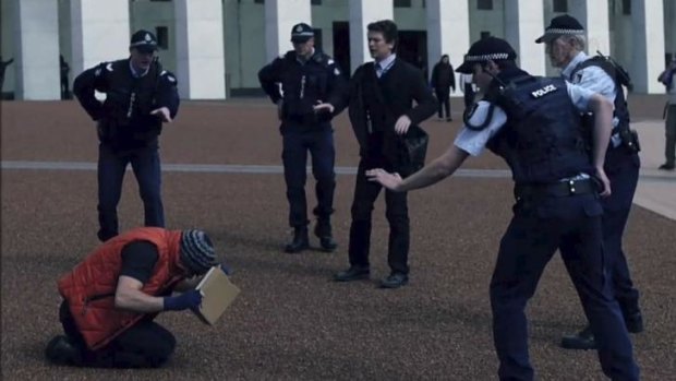 Police guarding Parliament House confront brothers played by Ashley Zukerman and Dan Spielman in the ABC political drama <i>The Code</i>, which was shot in Canberra. 