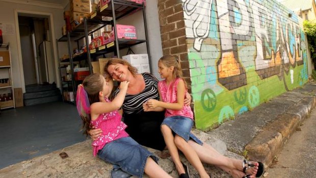 Help at hand: Rebecca Preston with grand-daughters, Tori, 7, and Tarni Ord, 8, at the Food Shed.