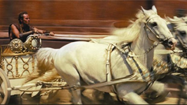 Charlton Heston in the famous chariot race from the 1959 <i>Ben-Hur</i>.