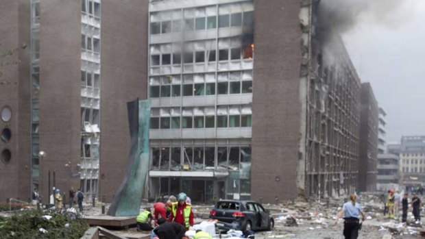Rescuers tend to the wounded after the blast rocked Norway's capital in the mid-afternoon.