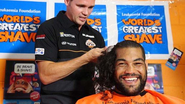 Hair for flair ... Daniel Geale shaves Adam Blair’s head for charity. Blair is hoping to rediscover his old form this year.