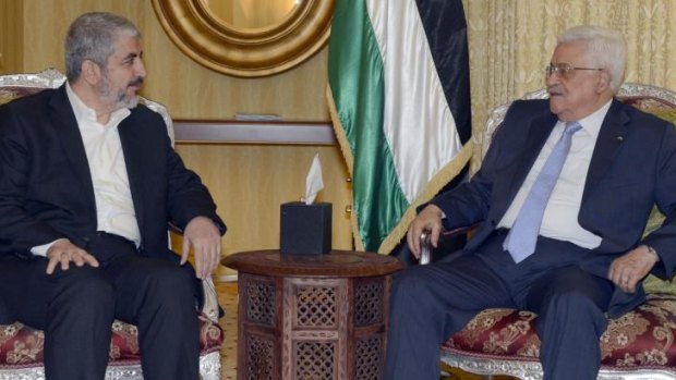 United approach: Hamas leader Khaled Meshal (left) with Mahmoud Abbas in Qatar on Sunday.