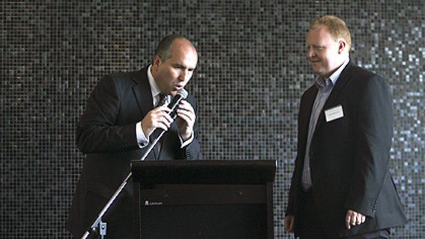 The challenger ... David Elliott checks the microphone for his mate, the 2GB drive presenter Jason Morrison.