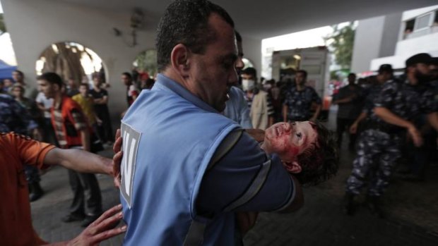 A girl injured in an Israeli strike in Shujaiyah, Gaza, outside a hospital.