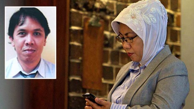Andrew Iskandar's mother,  Nita Iskandar, has denied being an accessory by helping her son leave the country following the murder of Mohd Saemin, inset.