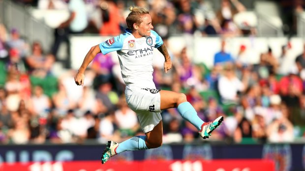 Leading by example: Jess Fishlock celebrates after opening the scoring. 