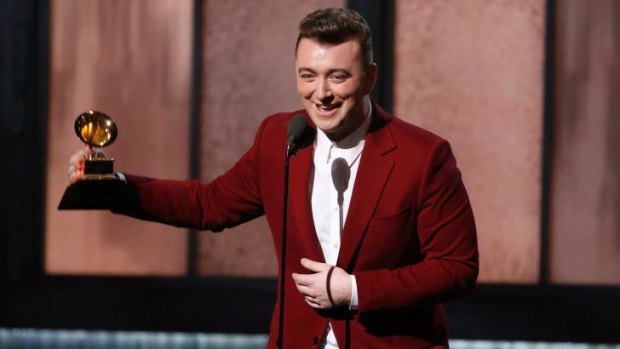 Sam Smith accepts the award for best new artist, one of four Grammys he won on Monday.