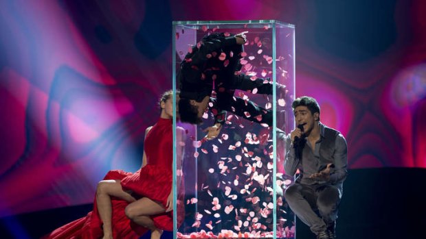 Azerbaijan's Farid Mammadoy (R) performs during a dress rehearsal for the 2013 Eurovision Song Contest.