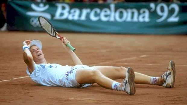 Marc Rosset falls to the ground after winning gold at the Barcelona Olympics.